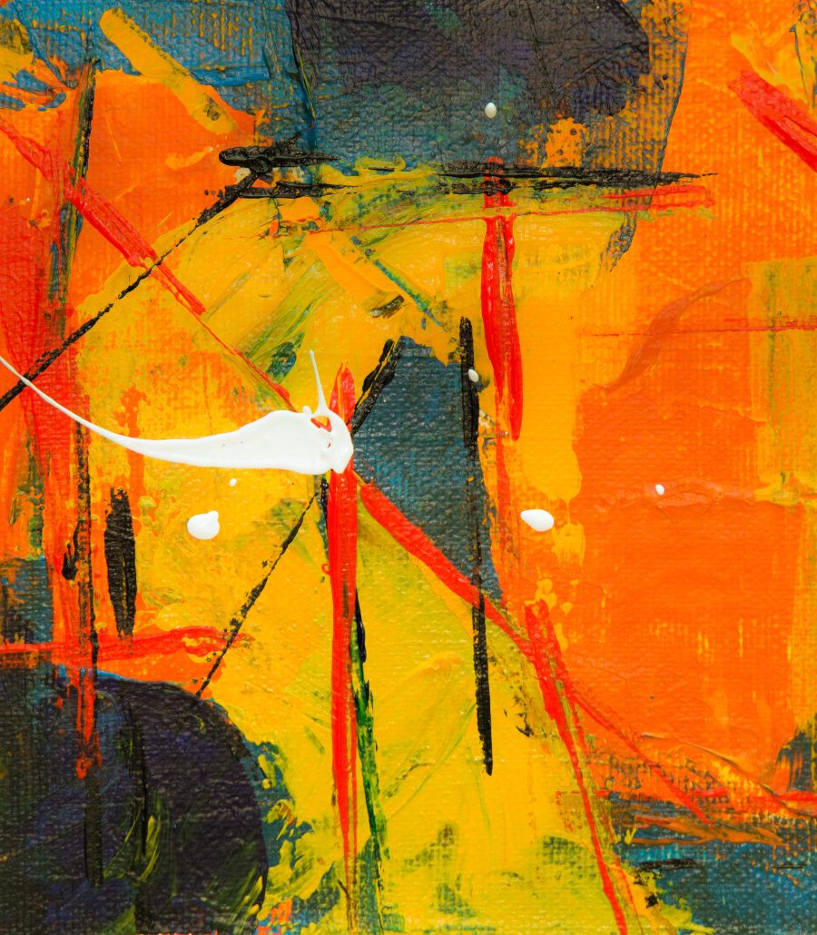 Close-up of an abstract painting in orange, yellow and red